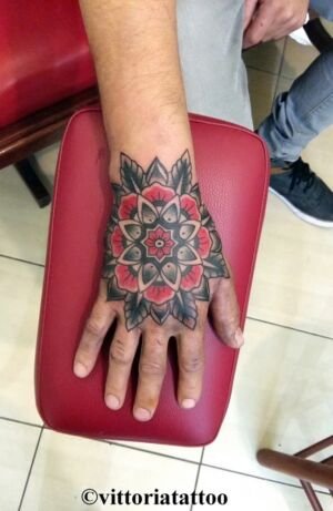 flower hand tattoo